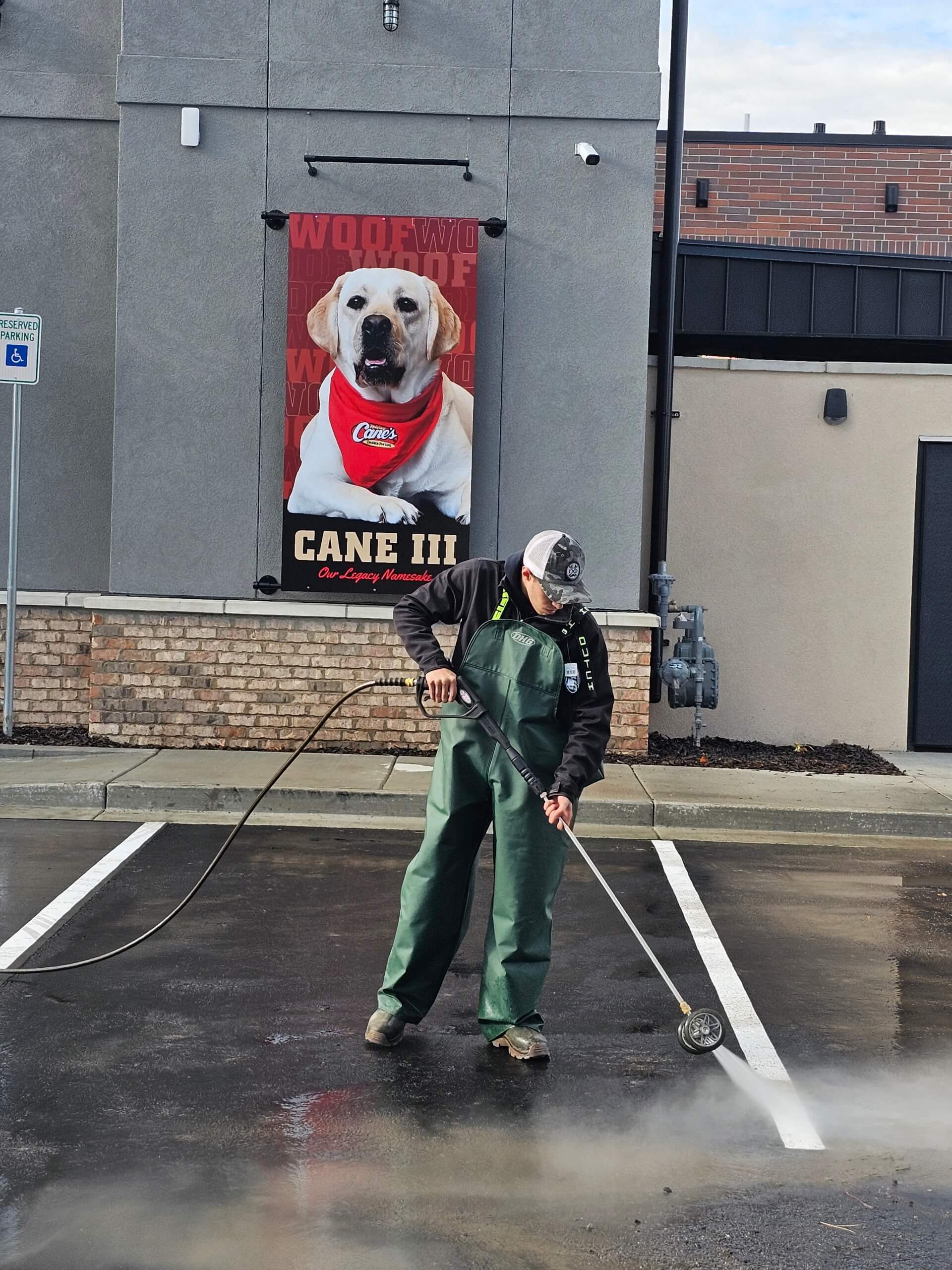 Pressure Washing The Wooden Fence
